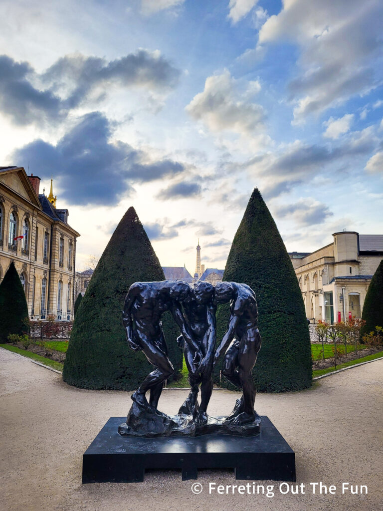 The Eiffel Tower peeks over the Rodin Sculpture Garden in Paris