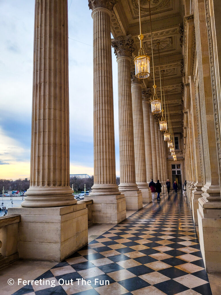 Strolling along the Hotel de la Marine loggia in Paris