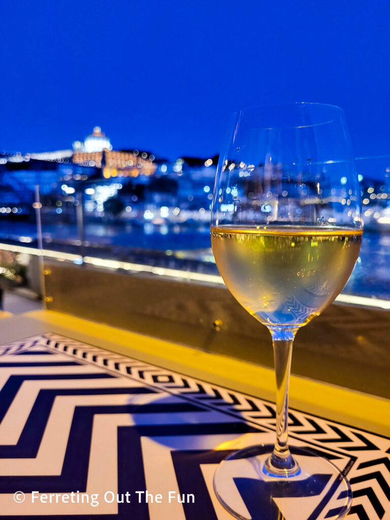 Sipping a white Portuguese wine during blue hour in Porto