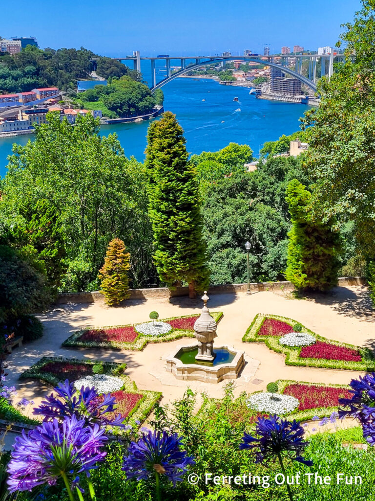 Colorful flowers in the Crystal Palace Gardens, with views of the Douro River and Atlantic Ocean in Porto