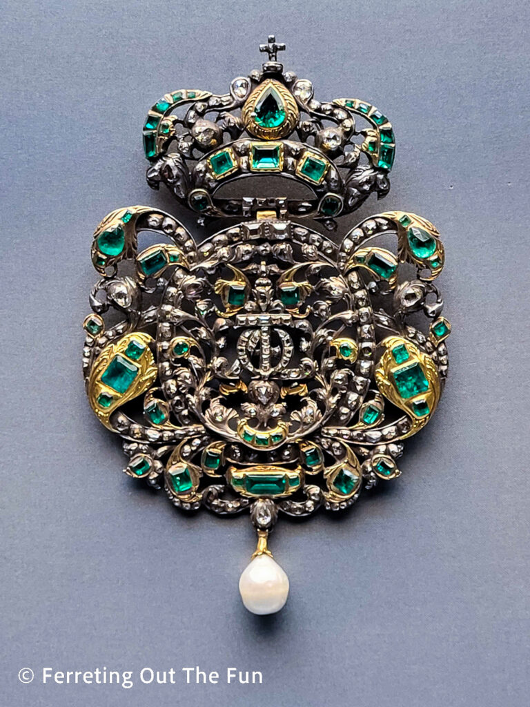 Emerald and diamond broach with teardrop pearl