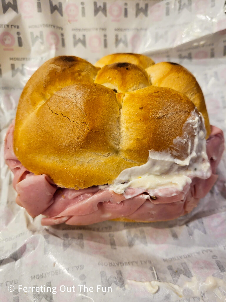 Mò Mortadella Lab sandwich with creamy Stracciatella cheese, tangy sundried tomatoes, and fresh basil. It's the best sandwich in Bologna.