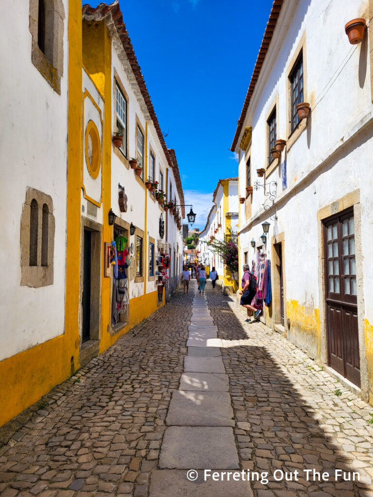 A narrow medieval street in Obidos Portugal