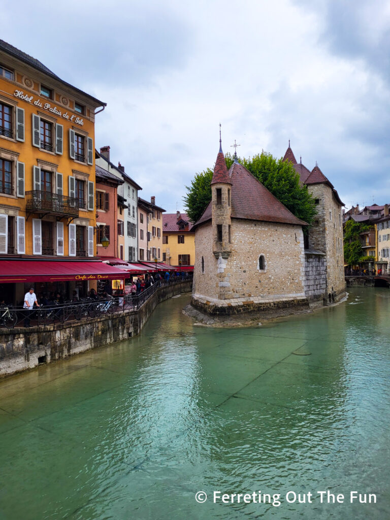 Palais de l'Île, a 12th century fortress, sits in a canal in Annecy, France