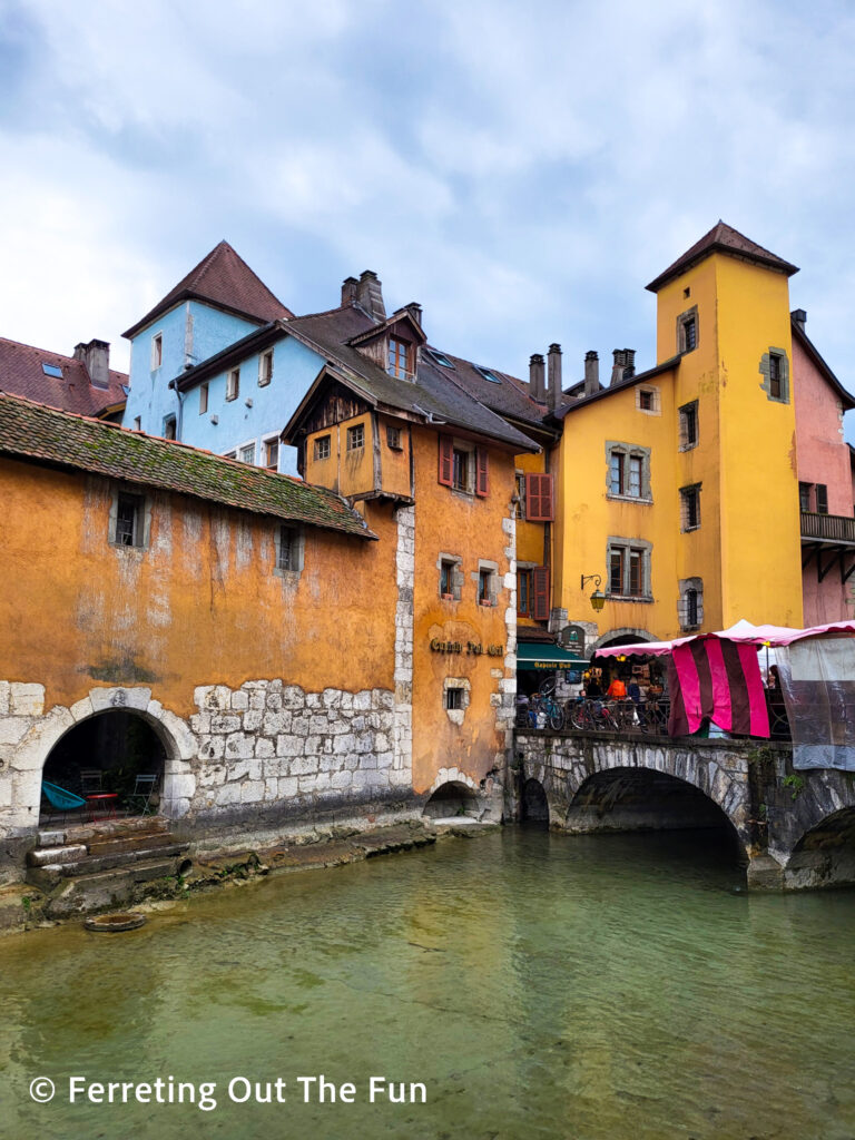 Colorful medieval buildings and stone bridges in Annecy, France