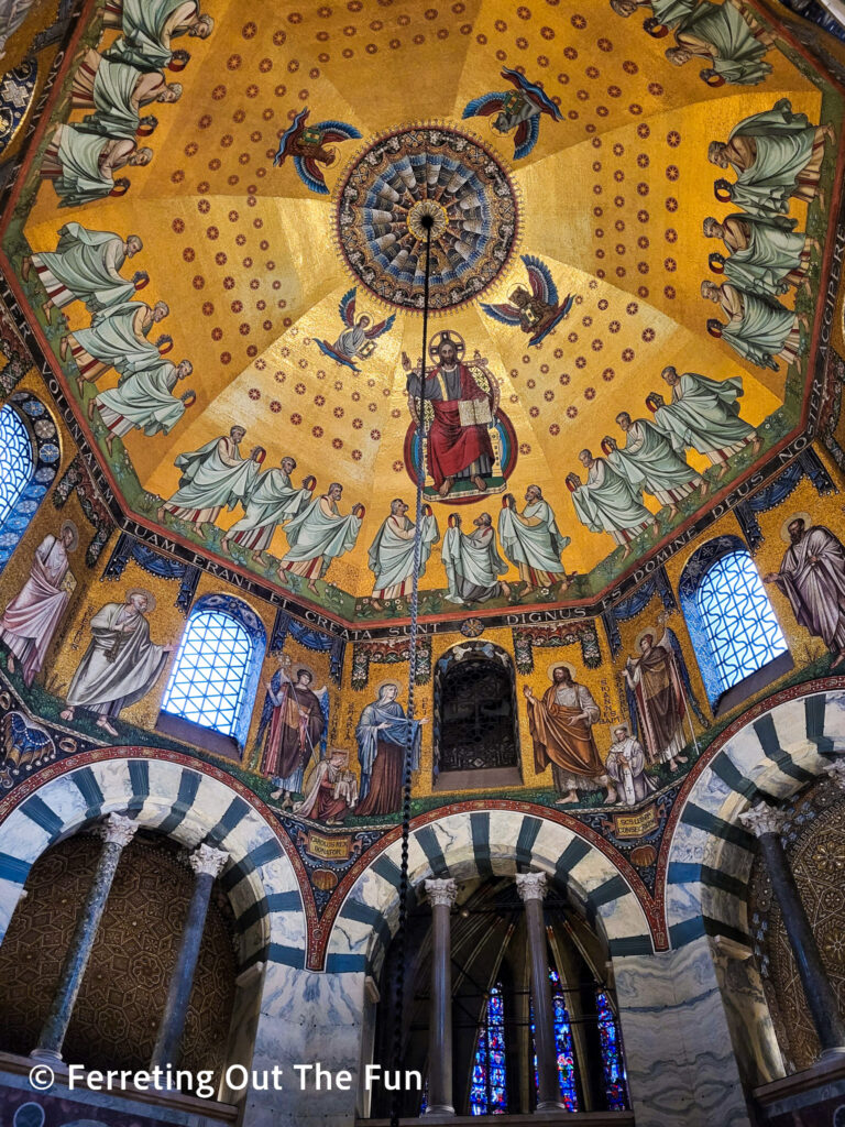 A golden mosaic covers the dome of Aachen Cathedral in Germany. The marble columns and arches were imported from Greece and Italy.