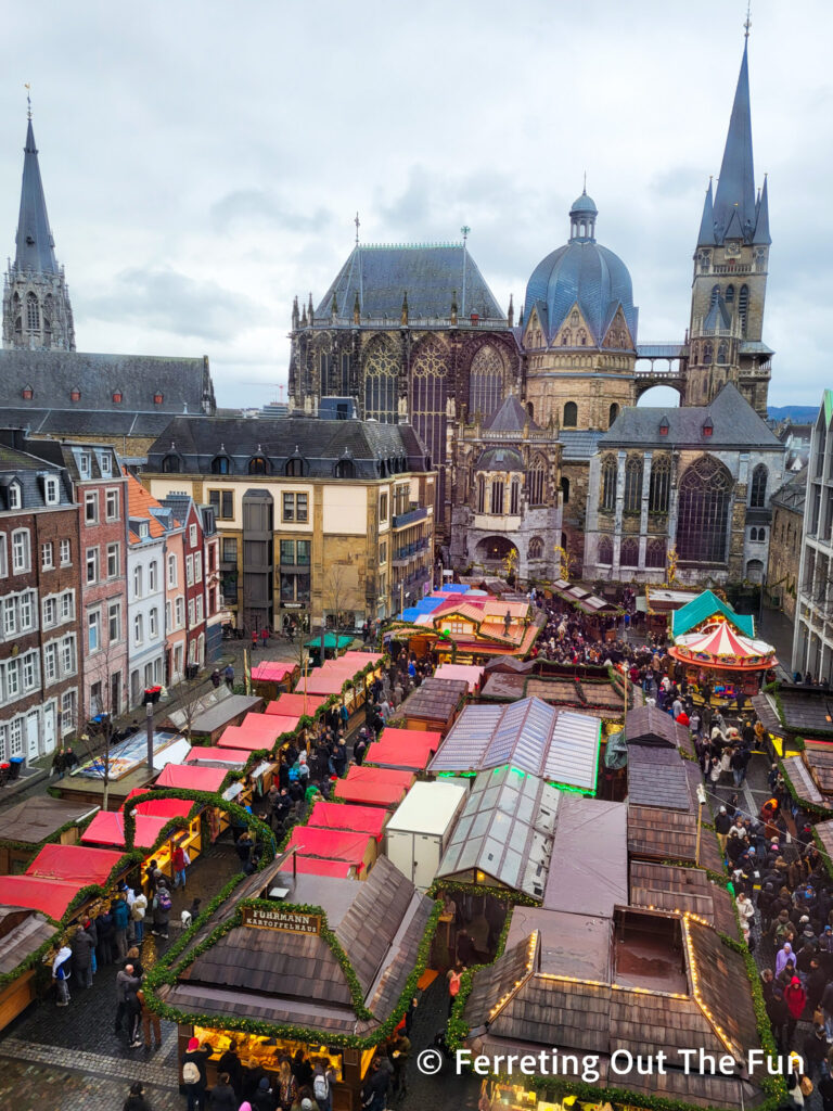 The 1,200 year old Aachen Cathedral soars over the stalls of the Christmas Market